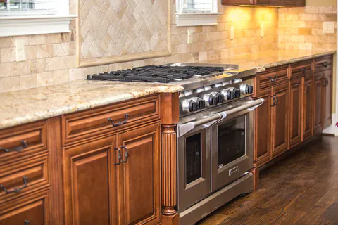 Clean kitchen cabinet and appliance finish from a remodeling project