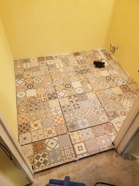 Flooring installation project photo showing LVP, tile or finished floor detail