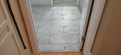 Flooring installation project photo showing LVP, tile or finished floor detail