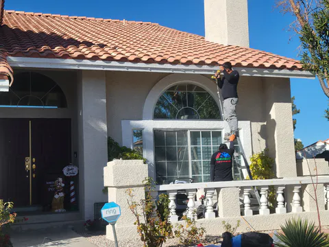 HOA violation repair project photo showing exterior stucco, paint or property correction work
