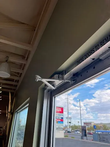 Storefront door closer and entry hardware repair photo
