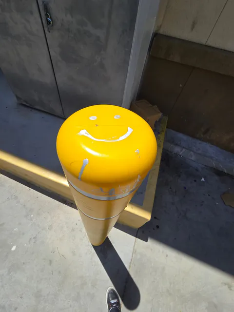 Commercial bollard top repair and exterior maintenance photo