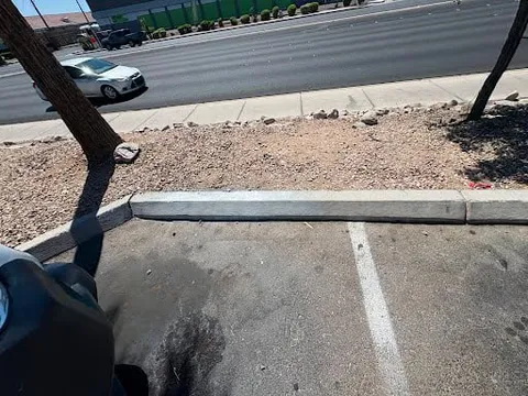 Commercial parking lot curb and exterior cleanup photo