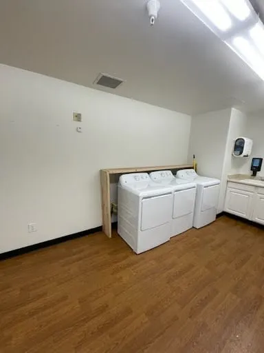Commercial laundry room finish work and appliance area repair photo