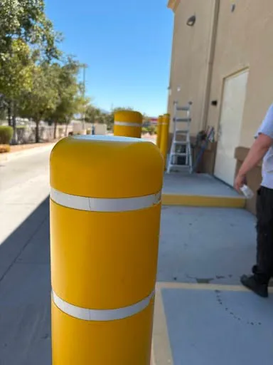 Commercial bollard and sidewalk area repair photo