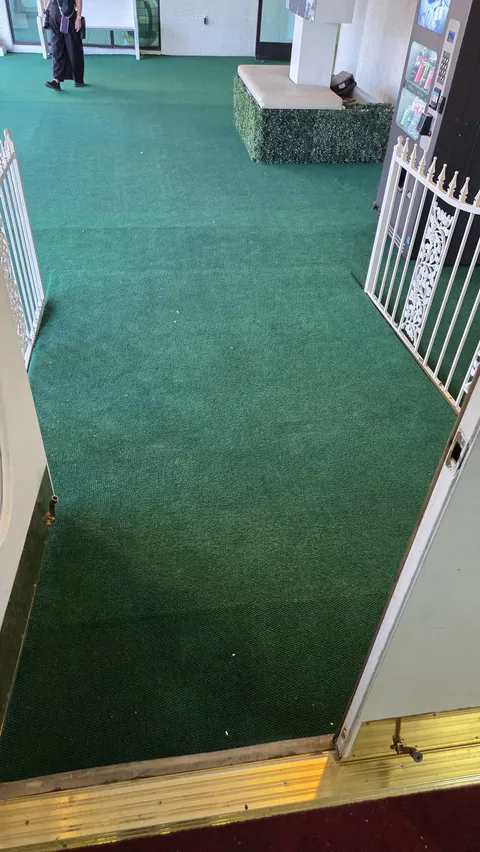 Commercial storefront turf finish and entrance repair photo